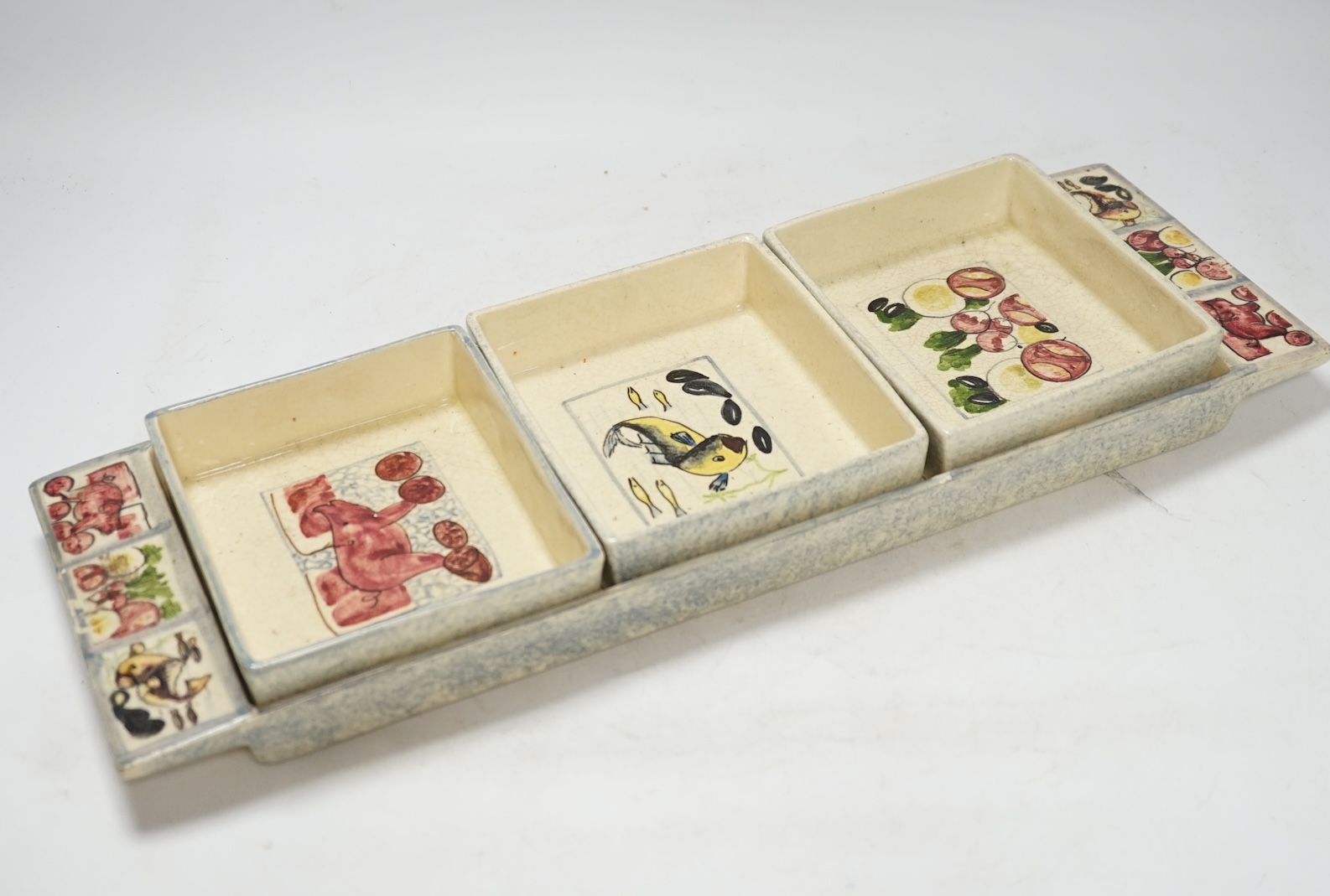 From the Studio of Fred Cuming. An Italian ceramic three section tray set, 43cm wide. Condition - fair, crazing throughout